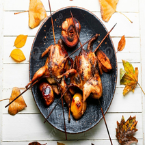 Cailles grillées au feu de bois